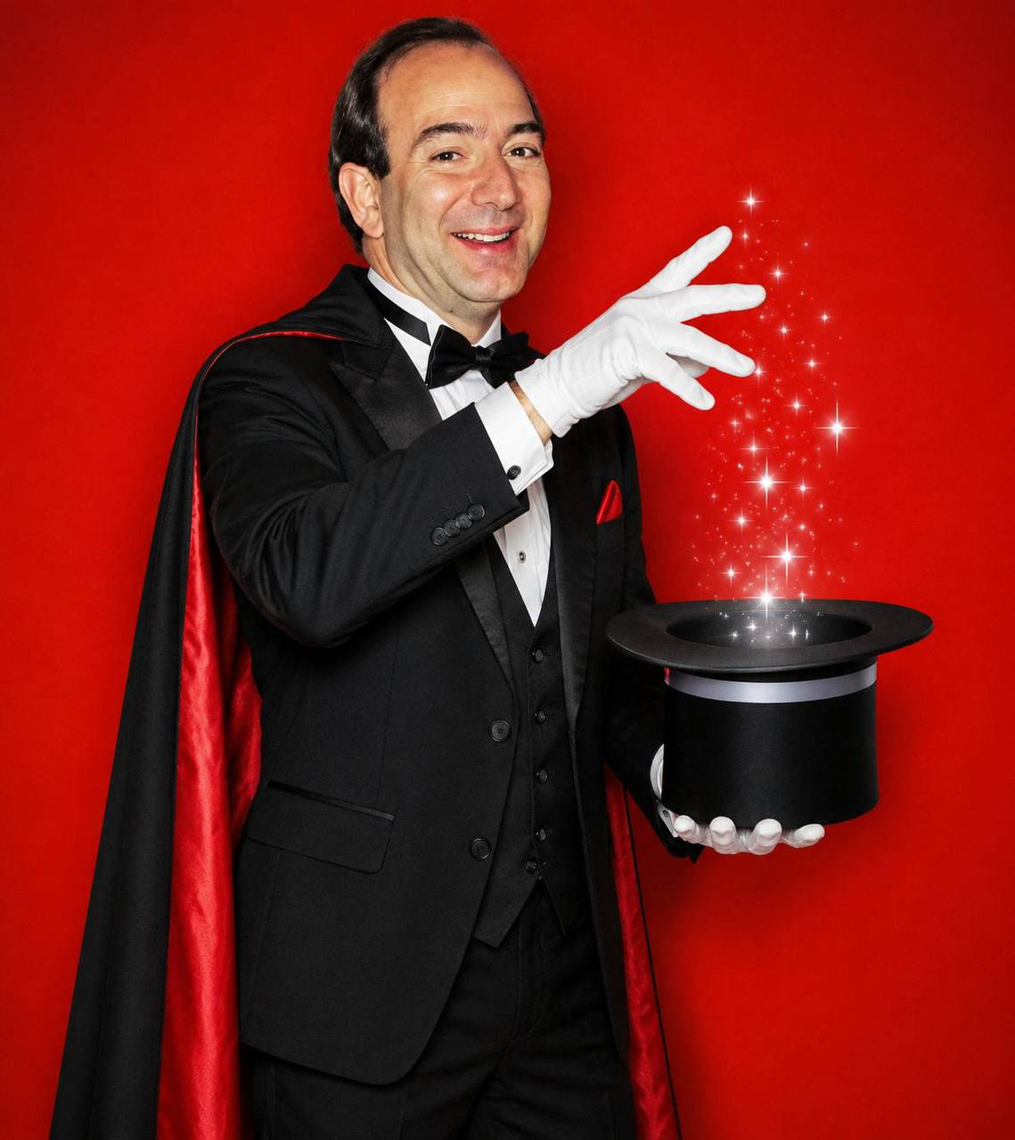 Magician holding a sparkling top hat